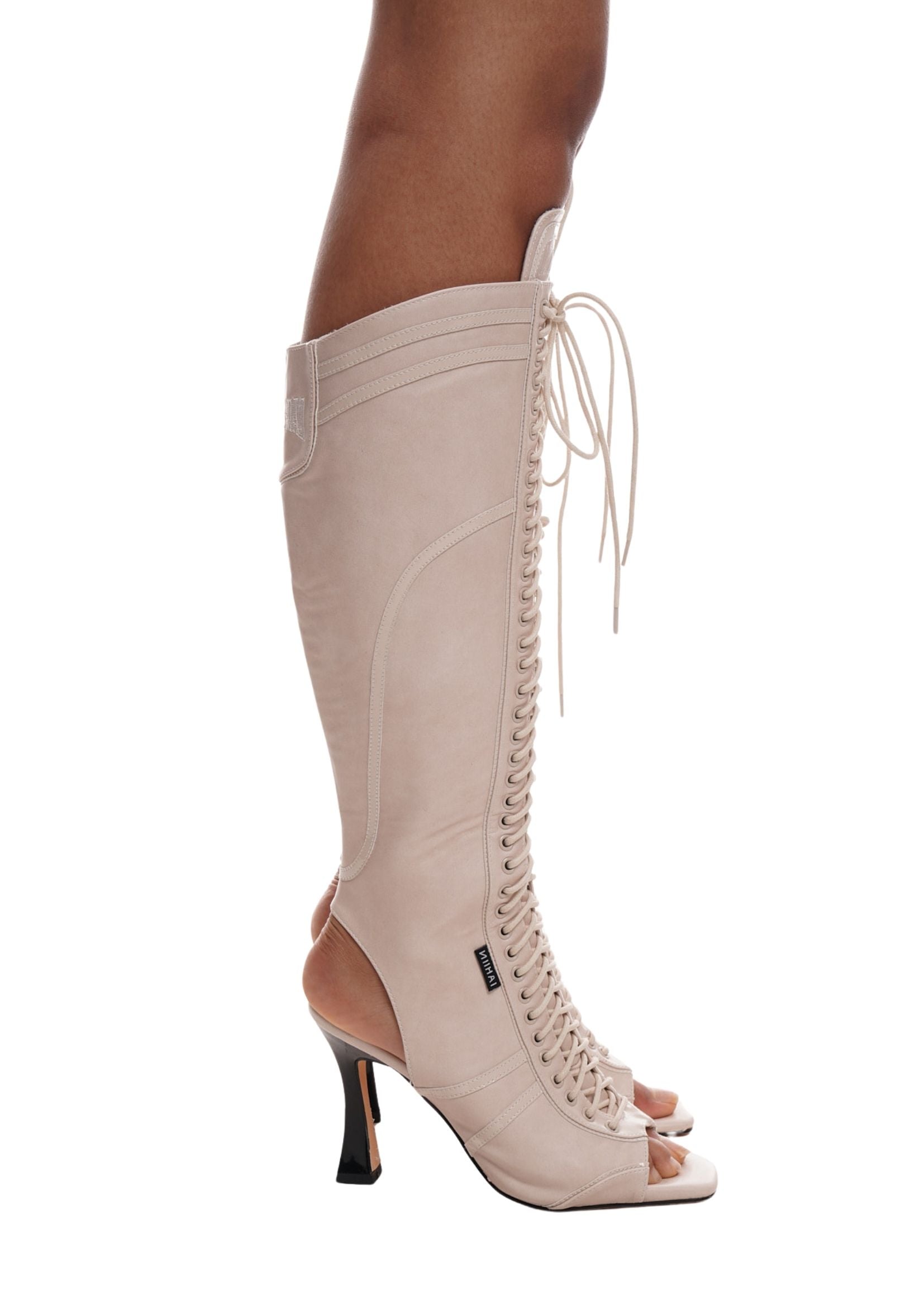 THE STRIKER LACE UP BOOTS IN ECRU